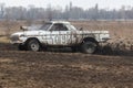 Retro car GAZ 24 Volga on a country road outside the city.