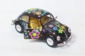 Retro car model on the white background. Toy model car volkwagen Beetle. Vintage car model. Old retro Beetle car. Royalty Free Stock Photo