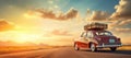 Retro car with a roof rack full of luggage on a backdrop of endless road ahead. Planning summer vacation Royalty Free Stock Photo