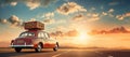 Retro car with a roof rack full of luggage on a backdrop of endless road ahead. Planning summer vacation Royalty Free Stock Photo