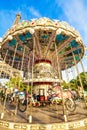 Retro carousel and Eiffel Tower