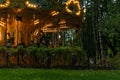 Retro carousel in the evening park