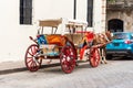 Retro carriage with a horse on a city street in Santo Domingo, Dominican Republic. Copy space for text. Royalty Free Stock Photo