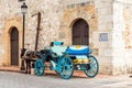 Retro carriage with a horse on a city street in Santo Domingo, Dominican Republic. Copy space for text. Royalty Free Stock Photo