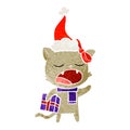 retro cartoon of a cat with christmas present wearing santa hat