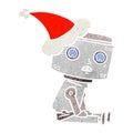 retro cartoon of a robot wearing santa hat