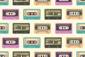 Retro cassette seamless pattern. Vintage audio cassettes in 90s, 80s, 70s style. Various colorful old cassettes to tape recorder. Royalty Free Stock Photo