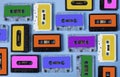 Retro cassette tape collection on blue background.