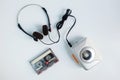 Retro cassette tape and Portable tape player with radio on white floor