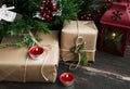 Retro Christmas Gifts under the Christmas Tree with Candles and Royalty Free Stock Photo