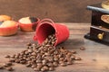 Retro coffee grinder, coffee mill coffee cup, chocolate cupcake, muffins, coffee beans. Wood backg