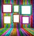 Retro colorful wood room with multicolored photo frames Royalty Free Stock Photo