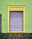 Colorful Art Deco Inspired Window with Steel Roller Blind at House #41 Royalty Free Stock Photo