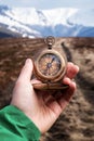 Retro compass in man hand Royalty Free Stock Photo