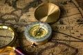 Retro compass with old map and magnifier Royalty Free Stock Photo