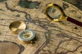 Retro compass with old map and magnifier Royalty Free Stock Photo