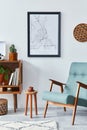 Retro composition of living room interior with mock up poster map, wooden shelf, book, stool, armchair, plant, cacti, vinyl.