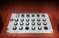 Retro control panel with buttons, colored lights and switches Royalty Free Stock Photo