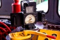 Retro control panel with speedometer of an old vintage steam train cabin close up. Royalty Free Stock Photo