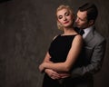 Retro couple on grey Royalty Free Stock Photo