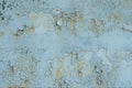 Retro, cracked light blue paint on a rusty door. Abstract background, texture. Stains. Natural pattern of peeling paint on a metal Royalty Free Stock Photo