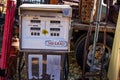 Retro Gasoline Pump In Junkyard Royalty Free Stock Photo