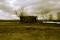 Retro destroyed wooden house in the deserted Royalty Free Stock Photo