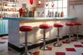 retro diner counter with stools and milkshakes Royalty Free Stock Photo