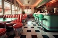 retro diner interior with checkerboard floor and soda counter Royalty Free Stock Photo
