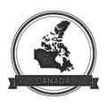 Retro distressed Canada badge with map.