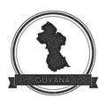 Retro distressed Guyana badge with map.