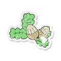 retro distressed sticker of a cartoon acorns and leaves