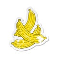 retro distressed sticker of a cartoon bananas Royalty Free Stock Photo