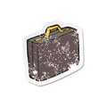 retro distressed sticker of a cartoon briefcase Royalty Free Stock Photo