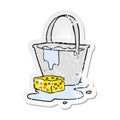 retro distressed sticker of a cartoon bucket of soapy water Royalty Free Stock Photo