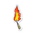 retro distressed sticker of a cartoon burning match Royalty Free Stock Photo