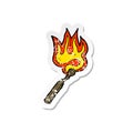 retro distressed sticker of a cartoon burning match Royalty Free Stock Photo