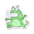 retro distressed sticker of a cartoon burping frog