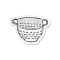 retro distressed sticker of a cartoon colander