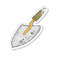 retro distressed sticker of a cartoon garden trowel Royalty Free Stock Photo