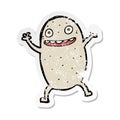 Retro distressed sticker of a cartoon happy potato