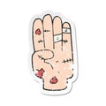 retro distressed sticker of a cartoon injured hand