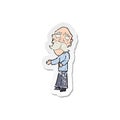 retro distressed sticker of a cartoon lonely old man