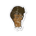 retro distressed sticker of a cartoon man with narrowed eyes