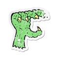 retro distressed sticker of a cartoon monster claw