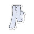 retro distressed sticker of a cartoon pair of jeans Royalty Free Stock Photo