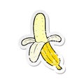 retro distressed sticker of a cartoon peeled banana Royalty Free Stock Photo