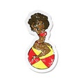 retro distressed sticker of a cartoon pin up girl sitting on ball Royalty Free Stock Photo