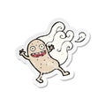 retro distressed sticker of a cartoon potato