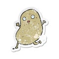 retro distressed sticker of a cartoon potato running Royalty Free Stock Photo